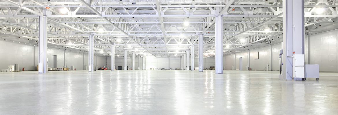 Floor slab in large empty warehouse 